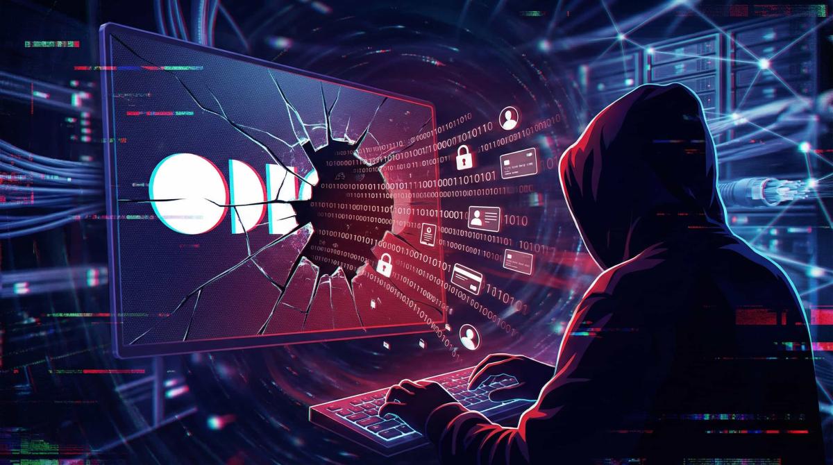 Hacker zit voor een scherm met het logo van Odido